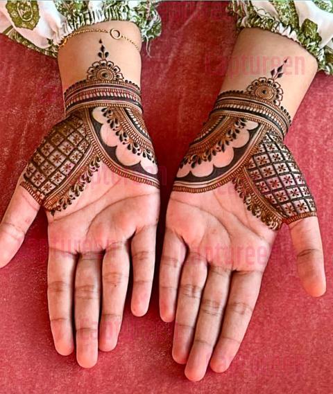 Stylish henna design for hand palmp