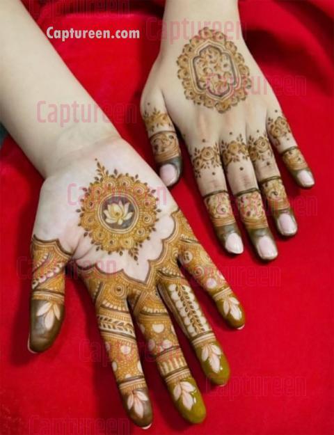 design of mehndi in front hand