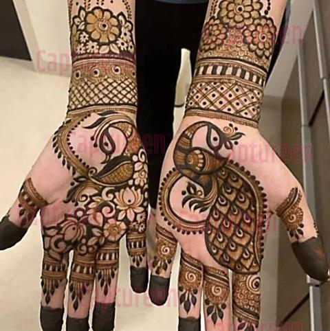 mehndi design front hand peacock